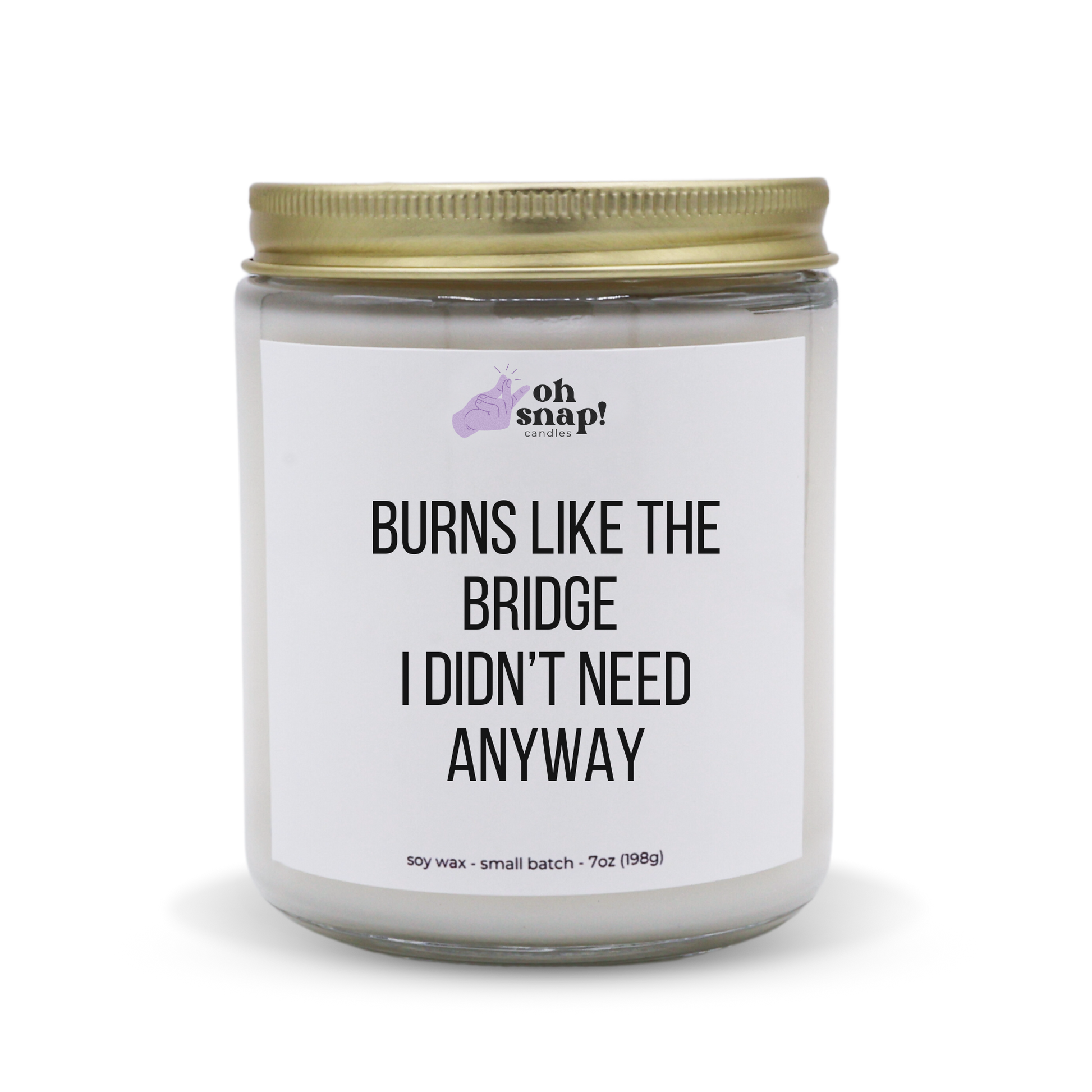 A candle with a label that says Burns Like The Bridge I Didn’t Need Anyways
