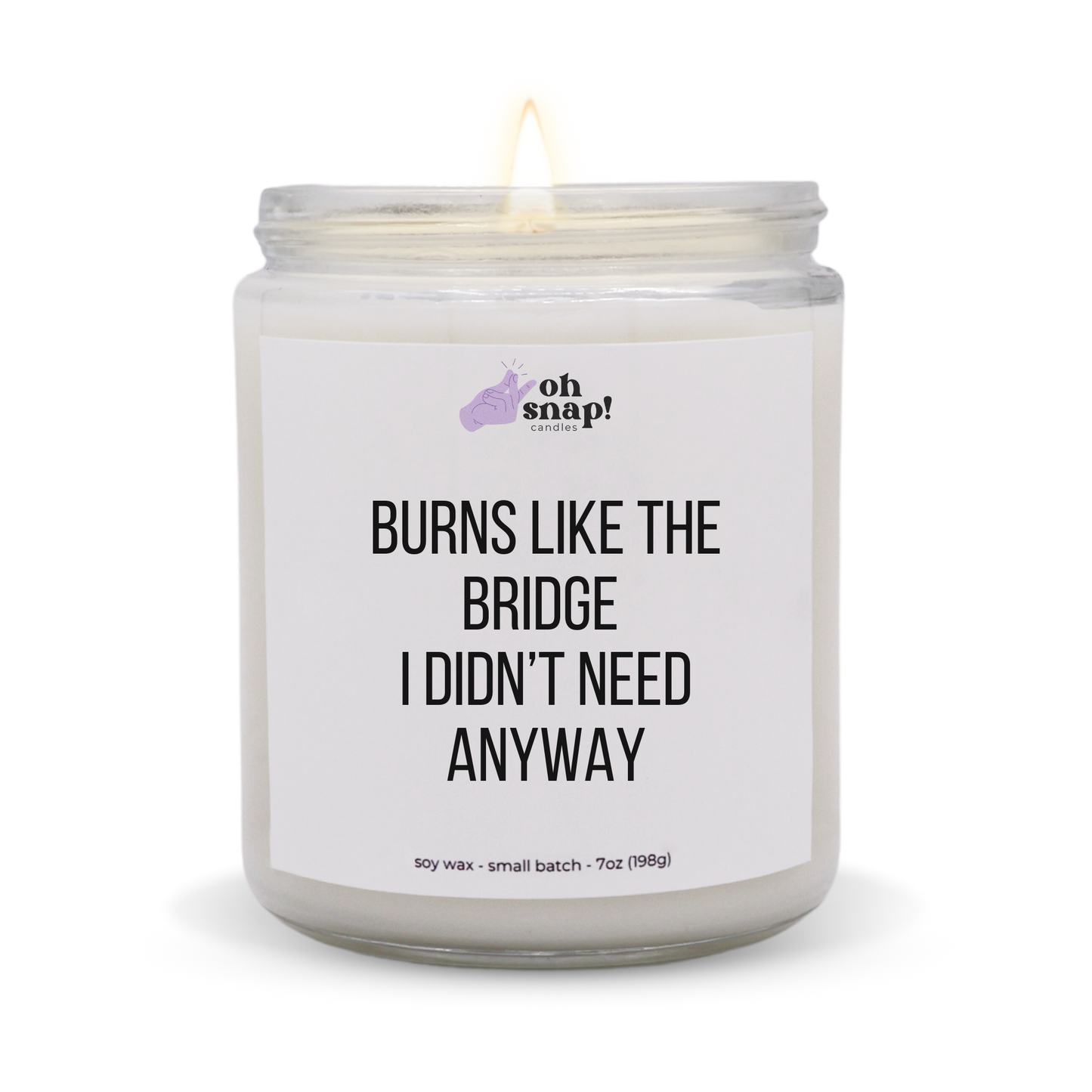 A candle with a label that says Burns Like The Bridge I Didn’t Need Anyways