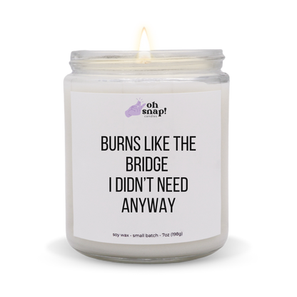 A candle with a label that says Burns Like The Bridge I Didn’t Need Anyways